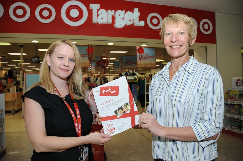 Target Dubbo manager Cherie Fuller and Uniting Care s Jacqui Tooth thank the residents of Dubbo for their generosity with the Target/Uniting Care Giving Box. Photo: BELINDA SOOLE