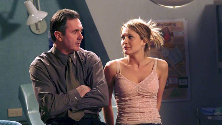 Surprise stories: Dr Karl Kennedy (Alan Fletcher) confesses to Izzy (Natalie Bassingthwaighte) in Neighbours.