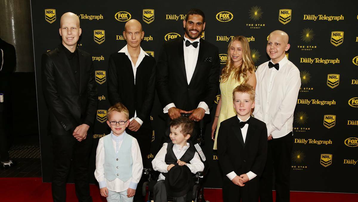 Greg Inglis and patients from the Sydney Childrens Hospital arrive at the Dally M Awards at Star City on September 29, 2014 in Sydney, Australia. Photo by Matt King/Getty Images
