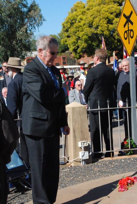 MORNING SERVICE: Niel Richardson President of the Narromine RSL Sub-Branch lays a wreath 