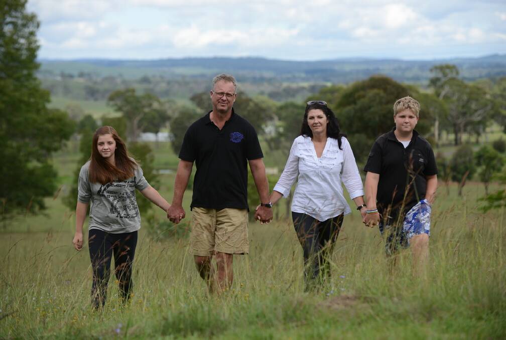 “LEGAL MEDS CAN BE FAR MORE DANGEROUS”: From left, Gabby Williams, 13 with father Jeff, morther Narelle and brother Kyle, 14. Mrs Williams uses cannabis oil for pain relief. Photo: BARRY SMITH