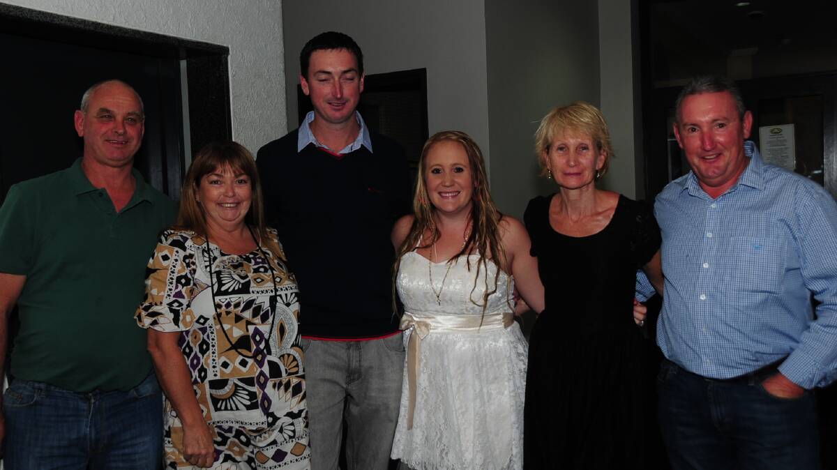 SAM AND JASON'S ENGAGEMENT: David, Bobbie and Jason Coyle with Sam, Anne and Norman O'Neil.  Photo: CAMILLA SOOLE
