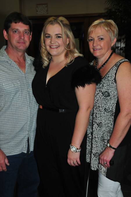 EMMA AND SHAUN'S ENGAGEMENT PARTY: Michael, Emma and Carol McDonald. Photo: HOLLY GRIFFITHS