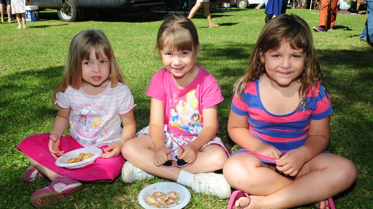 EASTER SATURDAY FARMERS MARKETS:  Mattea and Cailey Lack with Ameila Horwood. Photo CHERYL BURKE