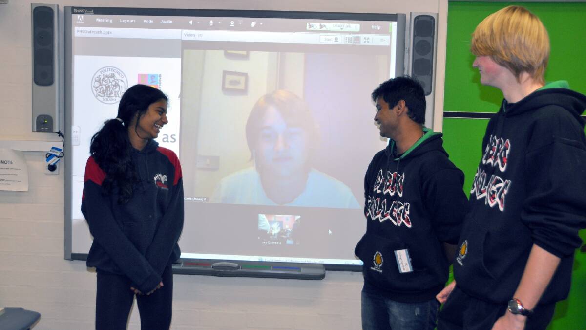 Dubbo College and xsel students Ashwini Manorathan, 

Chayan Deb Nath and Jacob Ware talk with Milan-based scientist Chris Cassell on video-link.