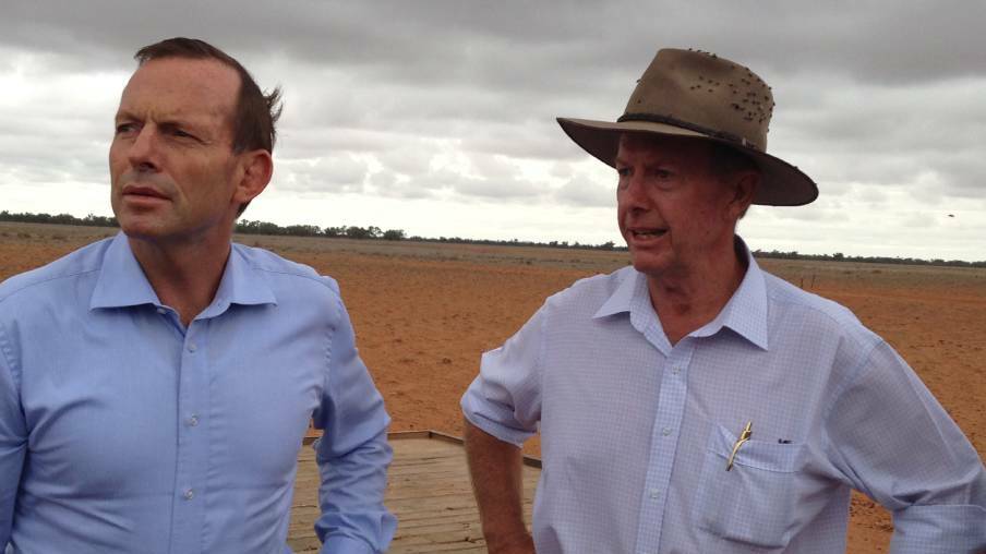 Former Prime Minister Tony Abbott and Parkes MP Mark Coulton on a visit to Walgett and Lightning Ridge in 2014. Photo: CONTRIBUTED