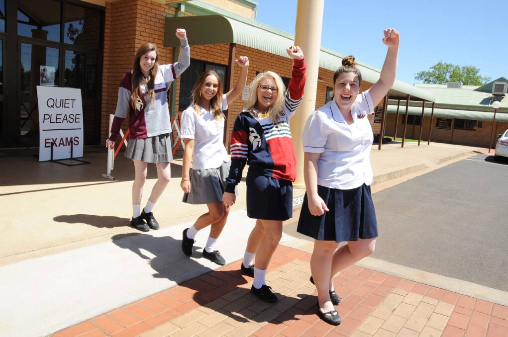 Hannah Wright, Maddison Wallace, Paris Burns and Candace Brien after they finished their final HSC exam. Photo: BELINDA SOOLE