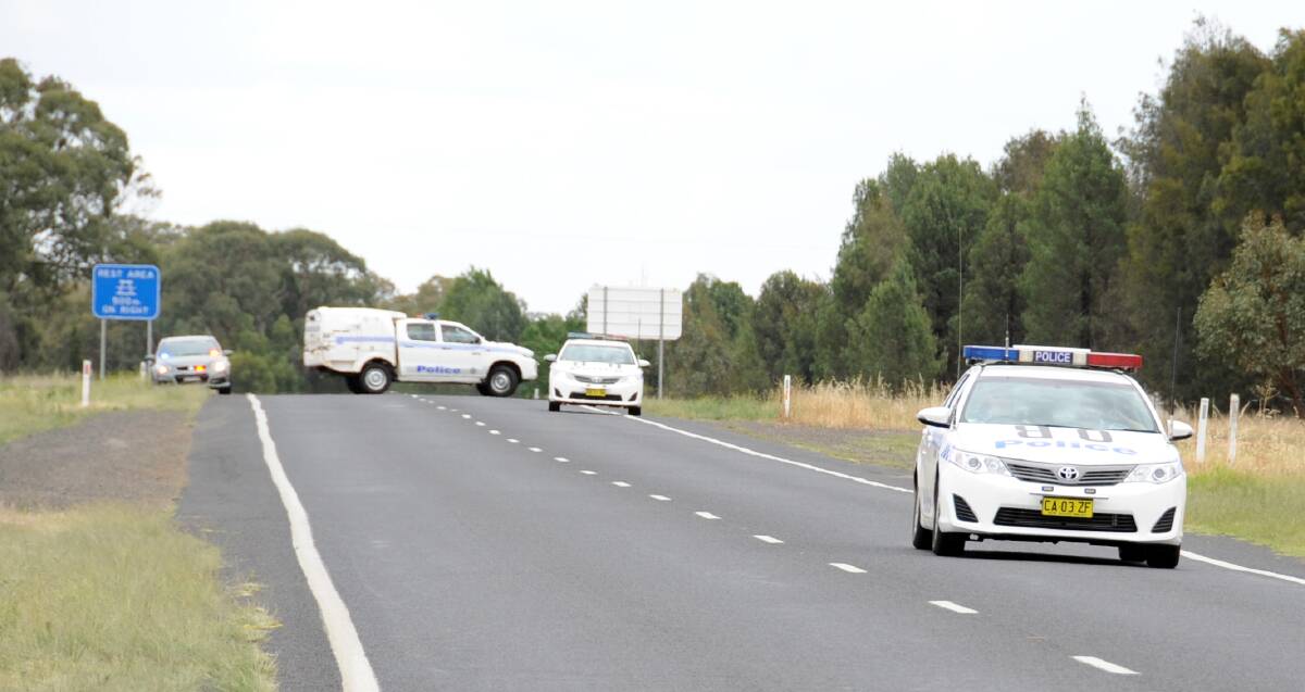 Police took a wanted man into custody west of Dubbo on Tuesday morning. 