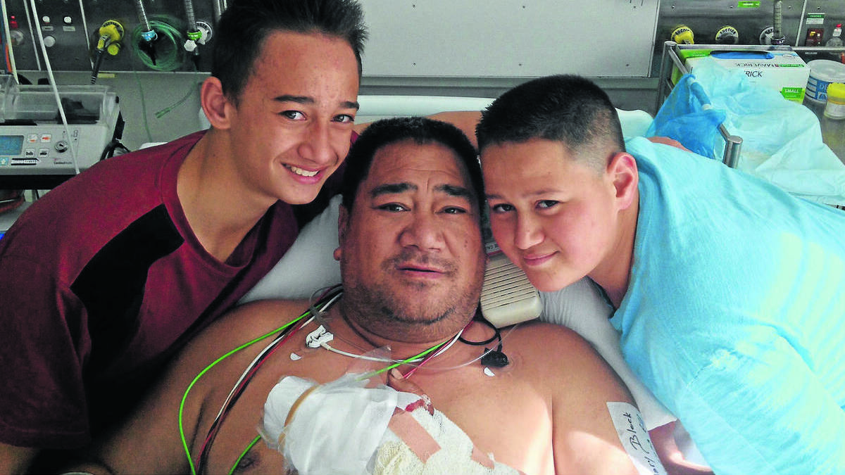 PROUD DAD: Henry Mahara is recovering in Westmead Hospital after an accident on Friday in which he severed two fingers. His sons, Nicolas and Preston, were instrumental in saving his fingers, which have been successfully reattached following surgery. Photo contributed
