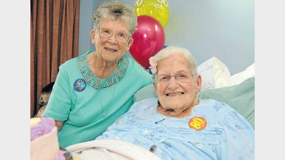 FEBRUARY: Judith Ferguson and Greta Brown celebrated their 80th birthday's in John Whittle House, Orana Gardens. Photo: AMY MCINTYRE