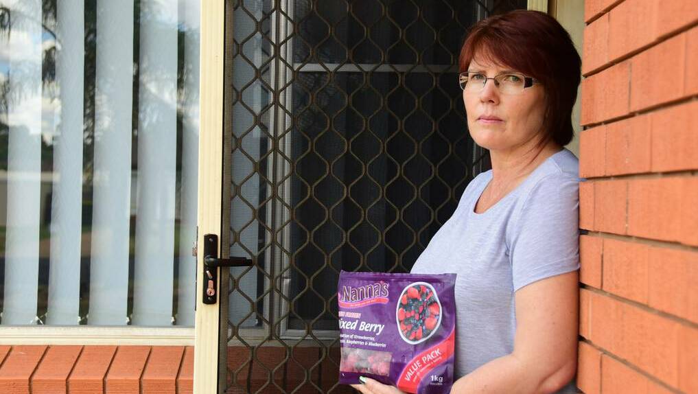 Leisa Roff with the packet of Nanna's frozen mixed berries that gave her Hepatitis A. Photo: BELINDA SOOLE