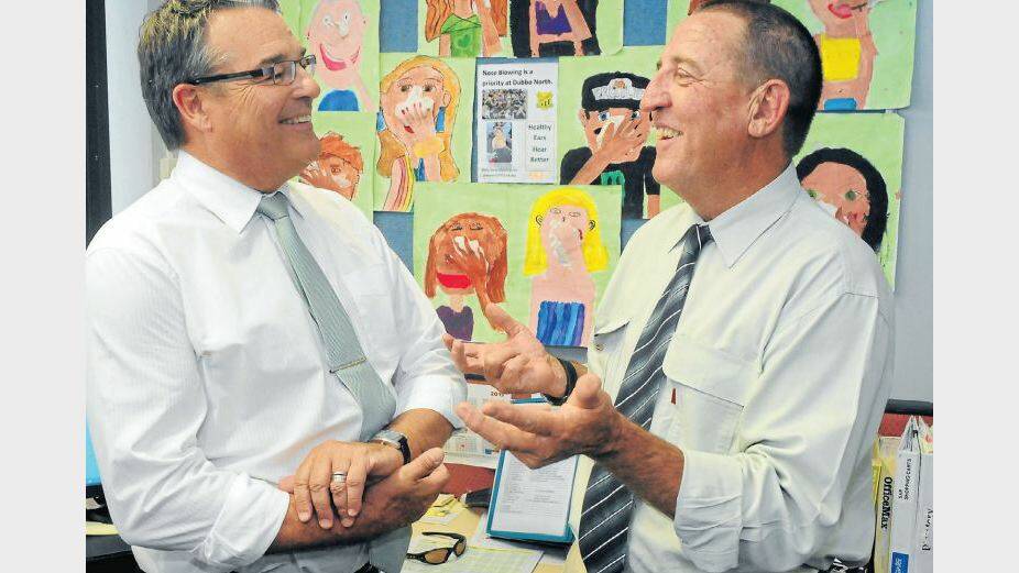 OCTOBER: Director Public Schools for the Macquarie Schools Network Michael Cronk and Dubbo Primary Principals’ Association president Craig Renneberg are
pleased with funding announcements for Public Schools for 2014. Photo: LOUISE DONGES