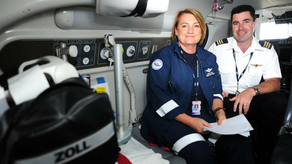 DUBBO: Royal Flying Doctor Service Dubbo Base staff, senior flight nurse Karen Barlow and pilot Ashley Myles, get ready for any emergency that comes their way on Christmas Day. Photo: BELINDA SOOLE