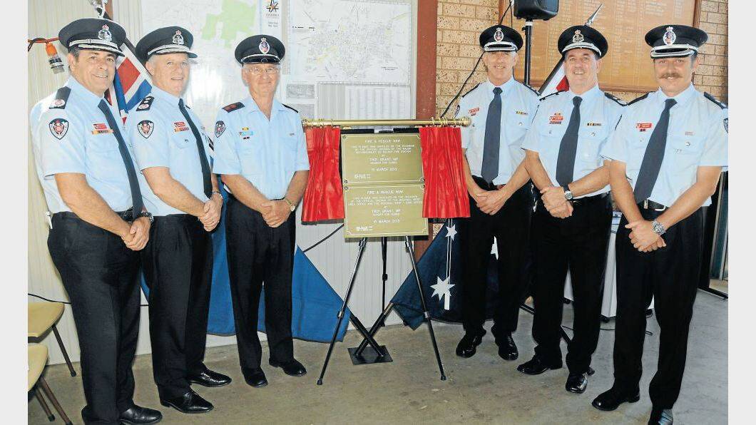 MARCH: Fire and Rescue NSW assistant commissioner Rob McNeil, commissioner Greg Mullins, Delroy Fire Station captain Bernie Reid, chief superintendant Neil Harris, deputy commissioner Jim Smith and superintendant Greg Lewis. Photo: AMY McINTYRE