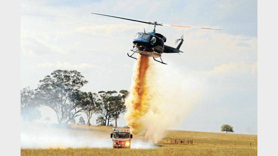 JANUARY: A fast-moving fire threatening property in West Dubbo was thwarted from the ground and the air. 