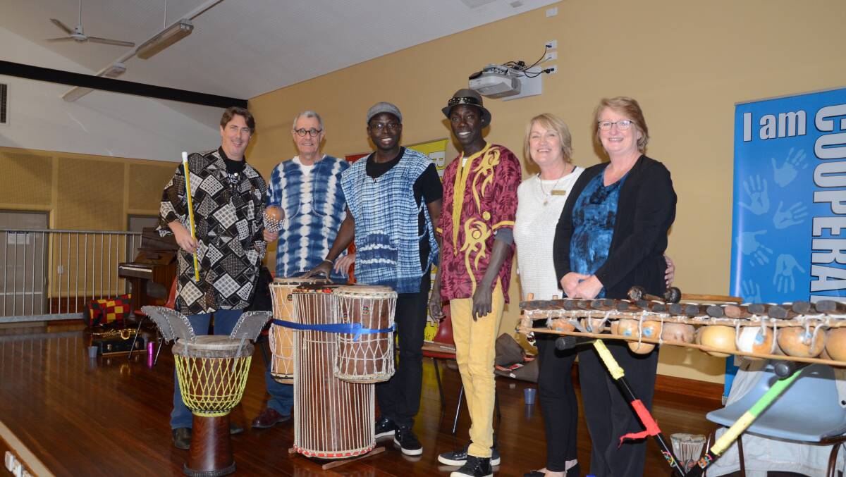 Musica Viva's 'Ternage' performers Blair Greenberg, Paul Chenard, Jean Pedro Gomes and Pape M'Baye, with Dubbo West Public
School music and drama teacher Marg Nicolson and principal Eileen Day. Photo: TAYLOR JURD