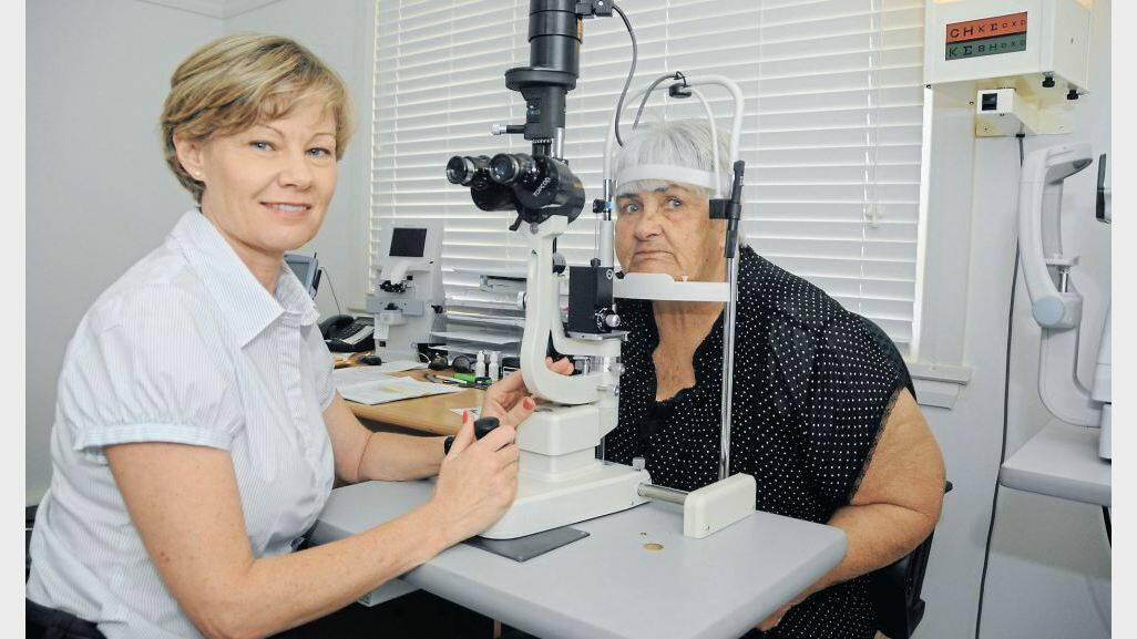 MARCH: Orthoptist Lee Kennedy examines Madge Nixon of Coonabarabran at the new public ophthalmology clinic in Dubbo. Photo: AMY McINTYRE.