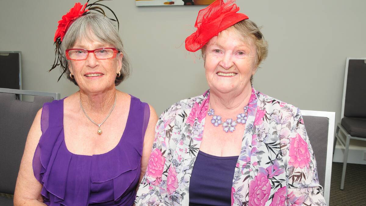 RED HAT LADIES: Mary Walker and Faye Orlando. Photo: JOSH HEARD.