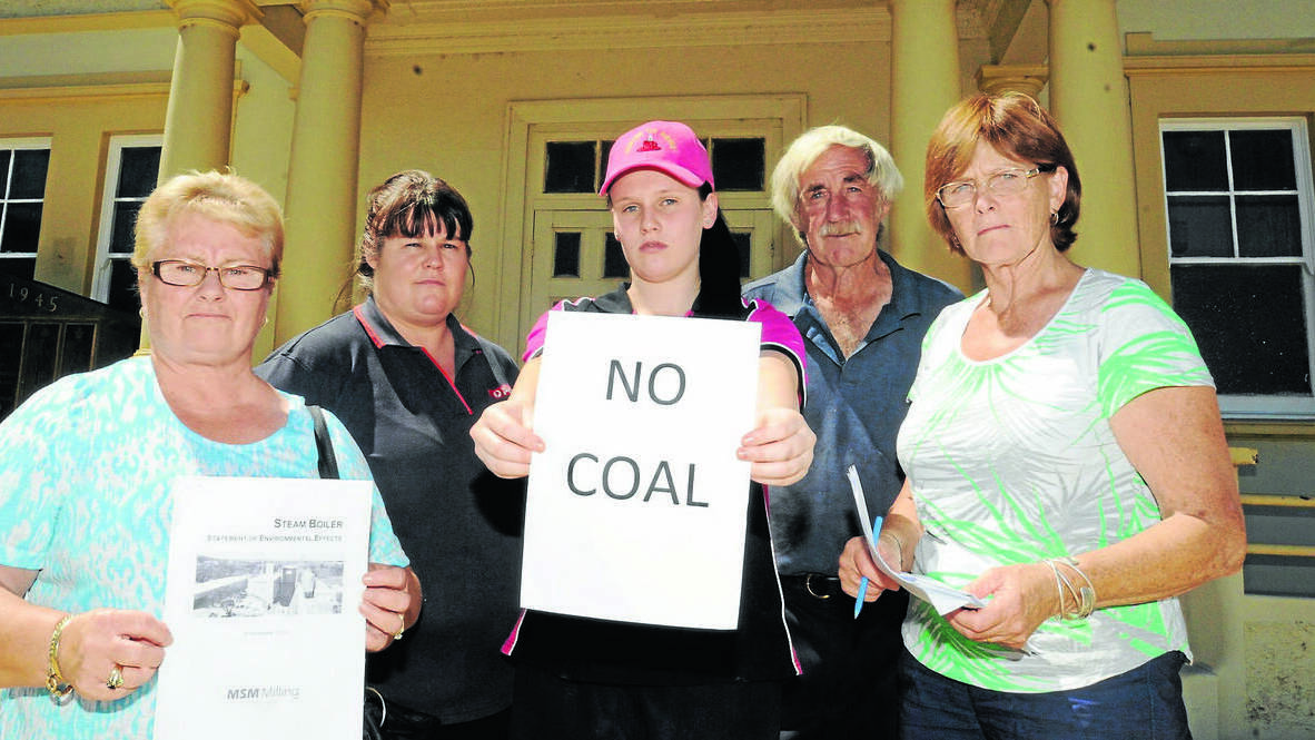 STANDING FIRM: Manildra residents Cheryl Bennett, Michelle Reimer, Maddie Press with Pat and Sue Williamson were not convinced that the proposed coal-fired steam boiler for Manildra should have their support at a community meeting on Tuesday night. Photo: STEVE GOSCH
