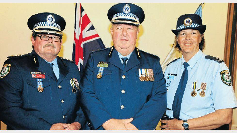 SEPTEMBER: Inspector Alan Cusack, Superintendent Stan Single and Senior Constable Nita Morris were recognised on an awards night for their long serving and outstanding careers. 