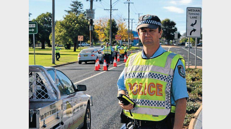 MAY: Sergeant Jason Bush is among highway patrol officers taking part in a high-visibility operation to mark the 30th anniversary of random breath
testing (RBT). Photo: SIMON CHAMBERLAIN
