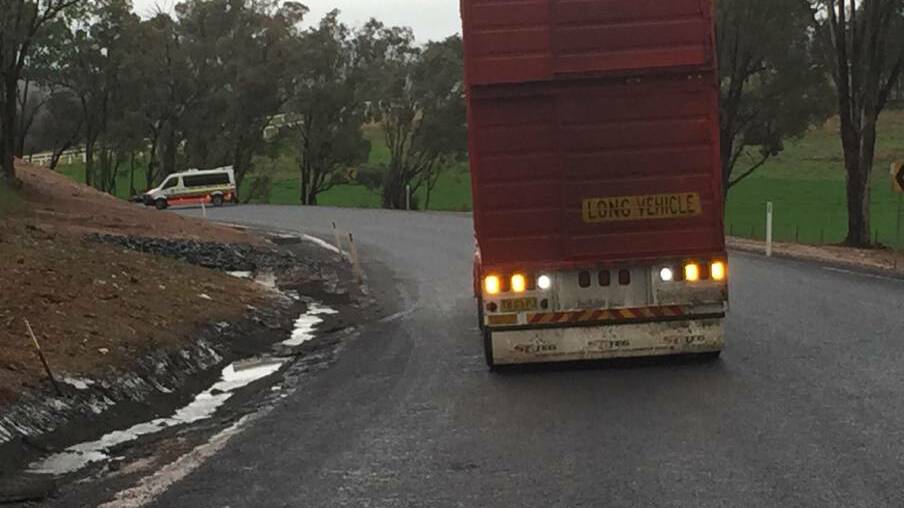 This cattle truck had to reverse about one kilometre after Highway Patrol declared the site of a fatal crash a crime scene and diverted traffic.
