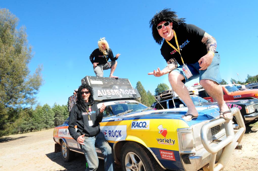 Rocking out at their Aussie Rock car is Stevo Whittam from Brisbane, Paully McManus from Brisbane and Rony Ball from Adelaide.