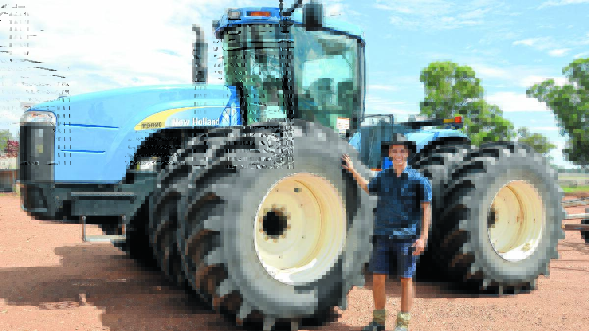 Today’s modern tractors make life a lot easier for today’s modern farmer. Hayden Westcott emphasised the size of the tractor. Photo: Bill Jayet 