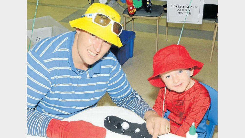 MARCH: Ryan and Dylan McQuade having fun together at the Dads For Kids Festival. Photo: CHERYL BURKE