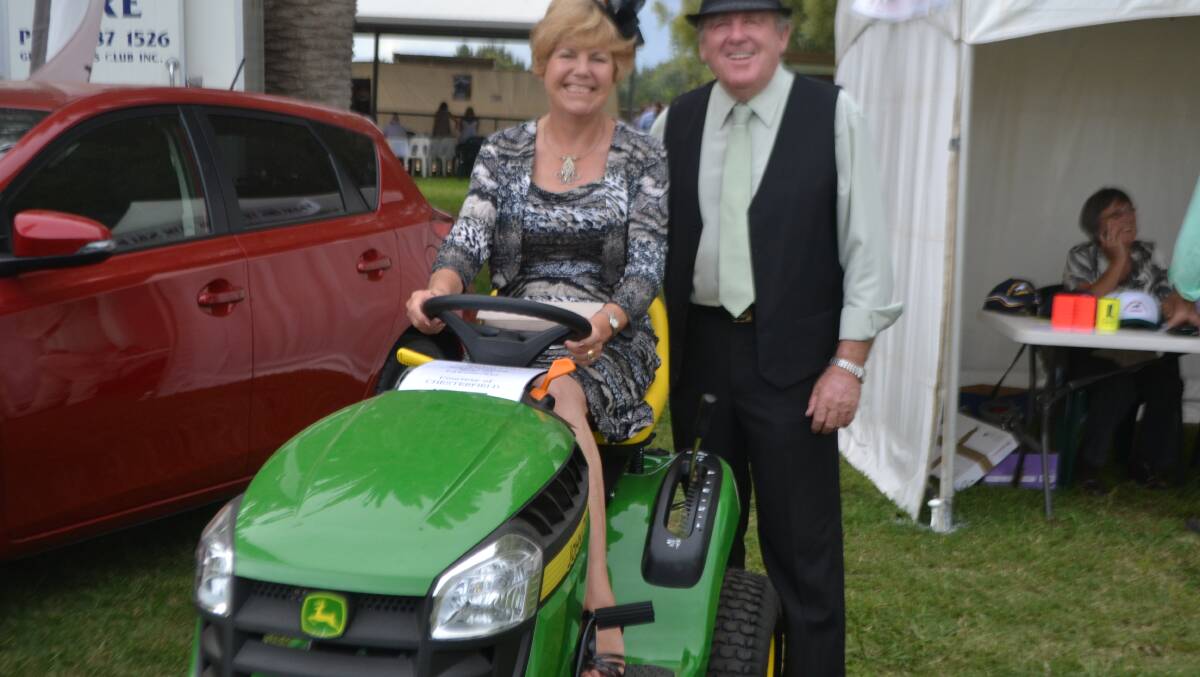 Pam and Mike Hayes with Chesterfield's lawnmover prize at the Boot
