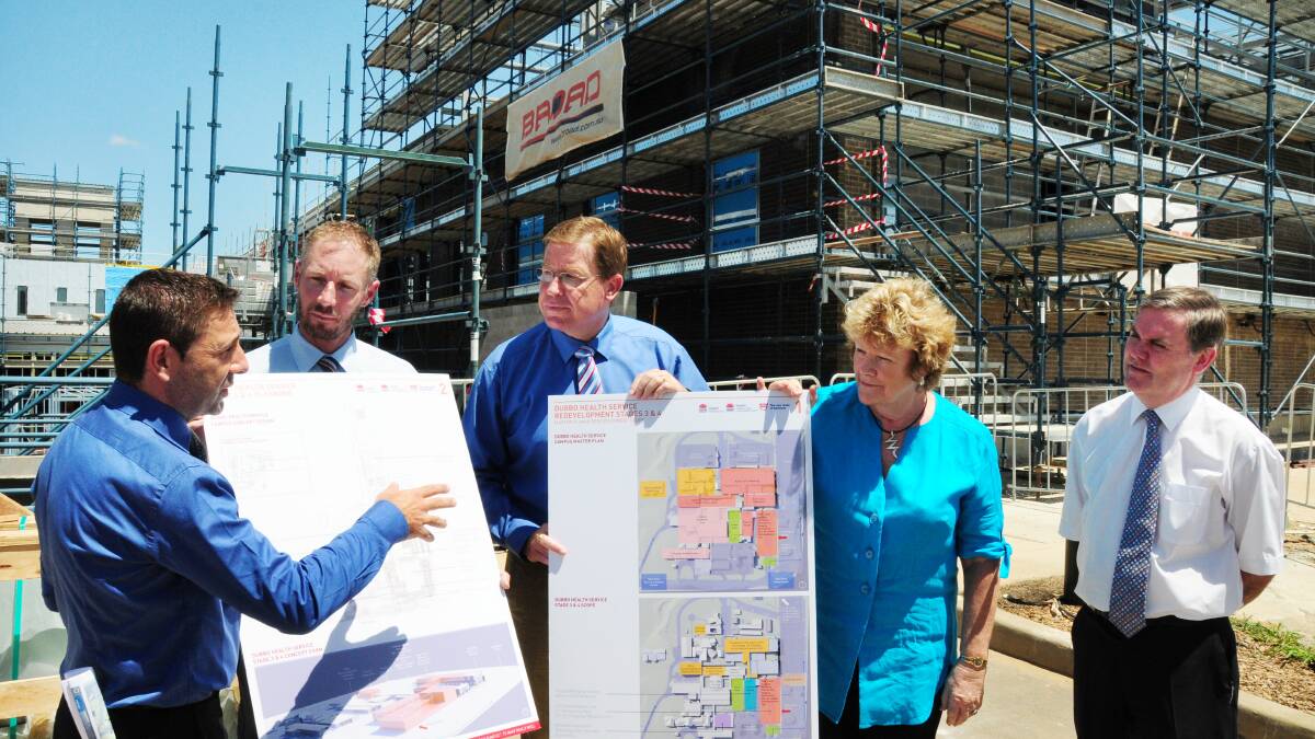 Senior project director for Health Infrastructure Bruno Zinghini with Western Local Health District chief executive Scott McLachlan, Dubbo MP Troy Grant, Jillian Skinner and Dr Robin Williams discussing the plans for the next phase of the Dubbo Hospital redevelopment. Photo: Belinda Soole