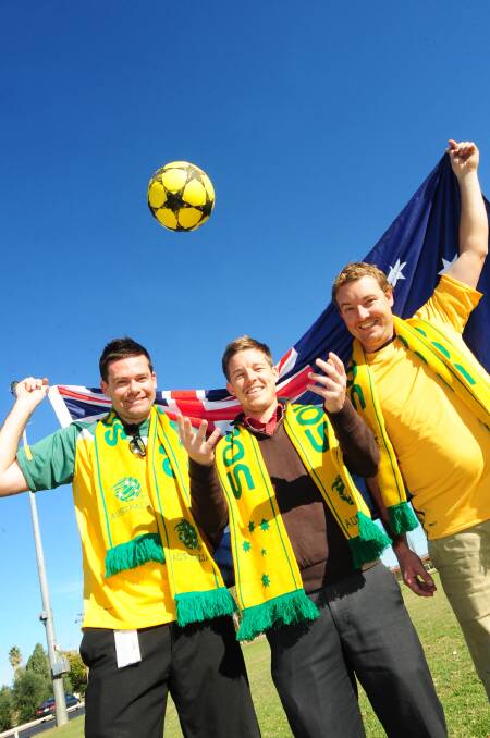 Alan Auld, Rhys and Leigh Osbourne of Macquarie United Football Club gear up for the World Cup. Photo: Belinda Soole