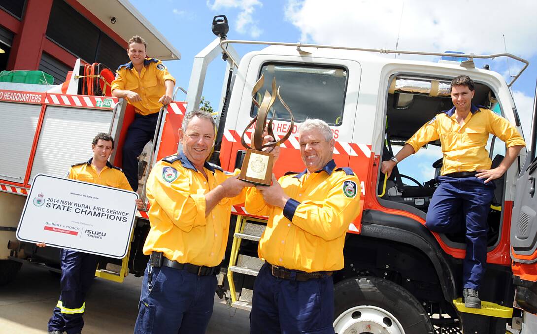 A triumphant Orana Composite Team, winners of the NSW RFS Championships, returned to Dubbo with their trophy. Pictured are Jason Conn, Brad O'Leary, Tim Conn, Peter Conn and Craig Walters. Joe Cooper (absent from photo). 											                                                         Photo: BELINDA SOOLE