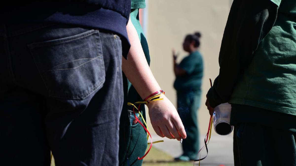 Inmates at the Mid North Coast Correctional Centre in Kempsey have a smoke before a smoking ban is enforced on Monday