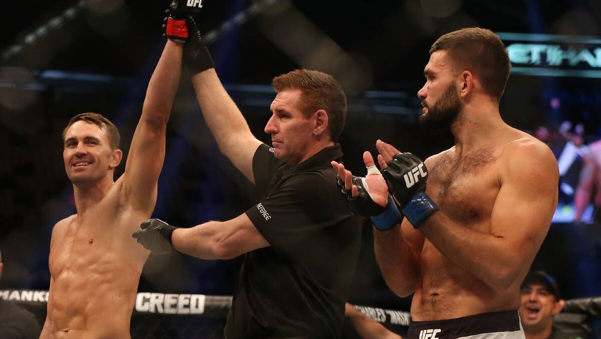 Referee Steve Perceval raises Kyle Noke's arm in victory at UFC 193 on Sunday. Photo: GETTY IMAGES
