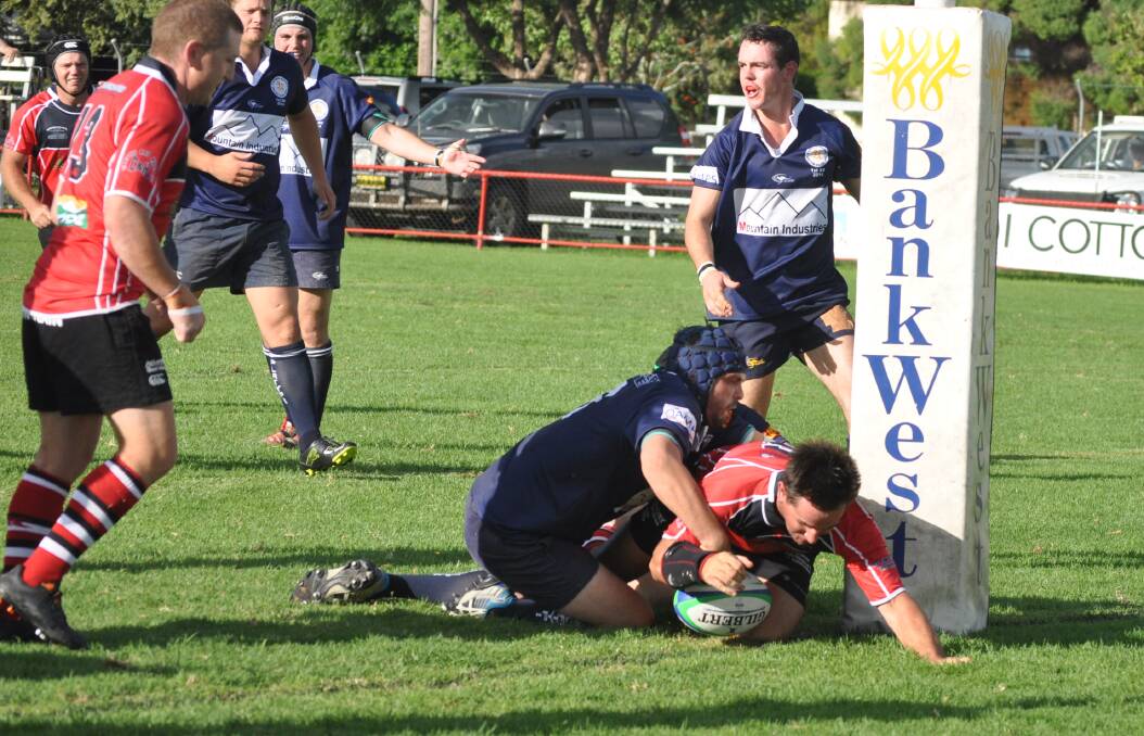 SO CLOSE: Narromine Gorillas' fullback Greg Wynn loses control of the ball as a try goes begging. Photo: BEN WALKER