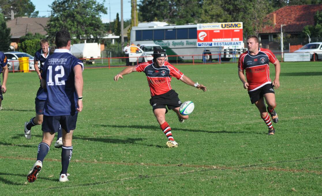 CLEARING KICK: Narromine Gorillas' CJ Smyth puts boot to ball in his side's win. Photo: BEN WALKER