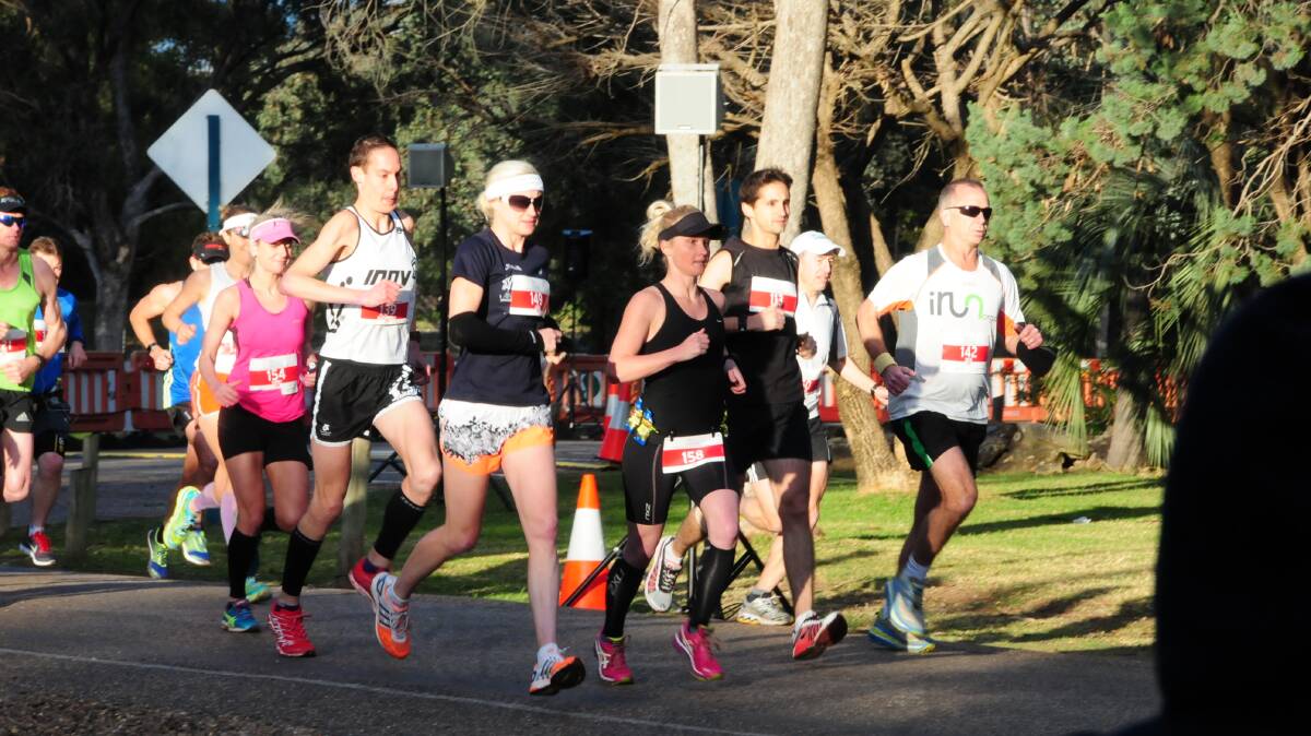 Alex Matthews (number 139) and Jane Fardell (number 149) were among the runners heading off at the start of the Rhino Rumble. Photo: LOUISE DONGES