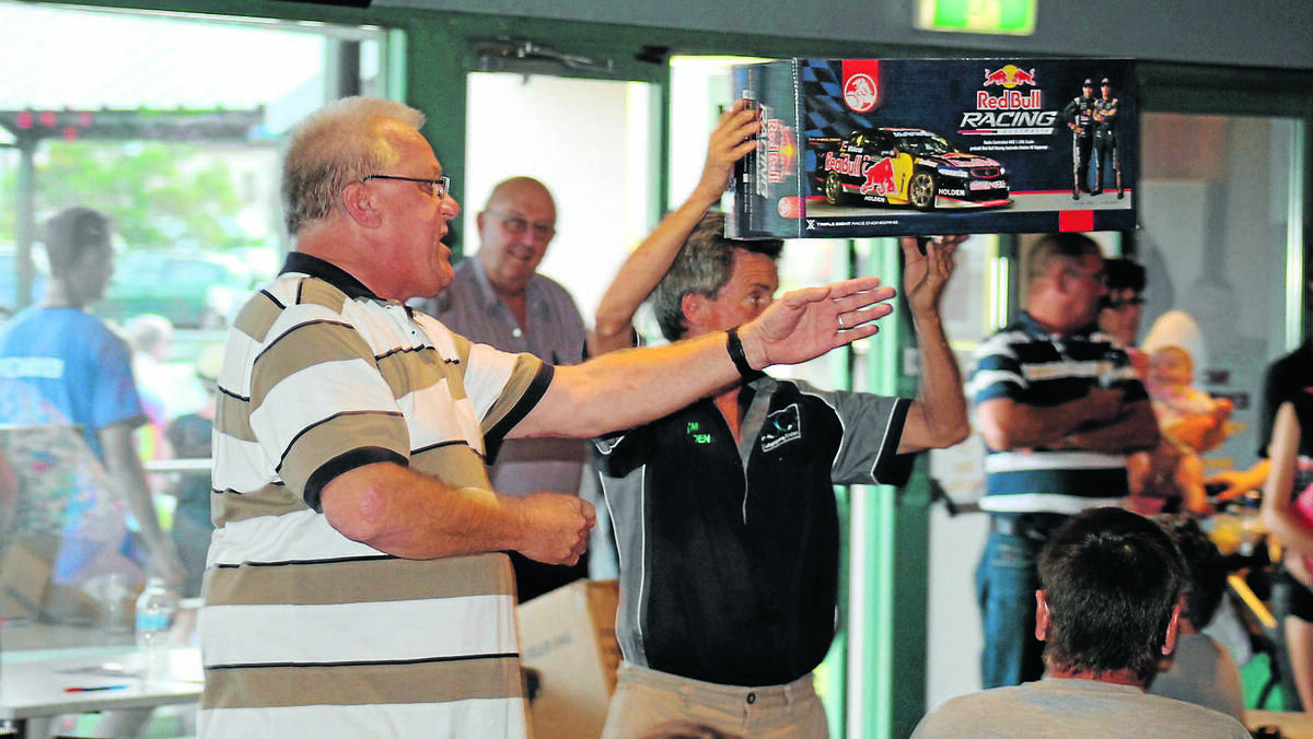 MUDGEE: Auctioneer Geoff Bartlett selling off a Redbull Racing remote control car at the Can Cruise charity auction, which added $10,000 to the event’s fundraising.