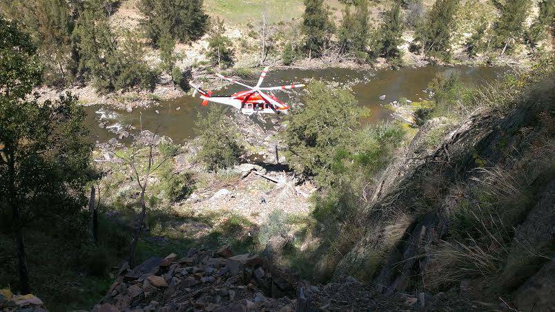 BATHURST NSW Ambulance Rescue Helicopter was called in to help after a motorcyclist fell around 75 metres down a cliff face. Photo: NSW Ambulance Media