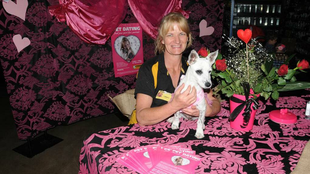Petbarn Dubbo store manager Melanie Currey with the beautiful Coco. Photo: HANNAH SOOLE