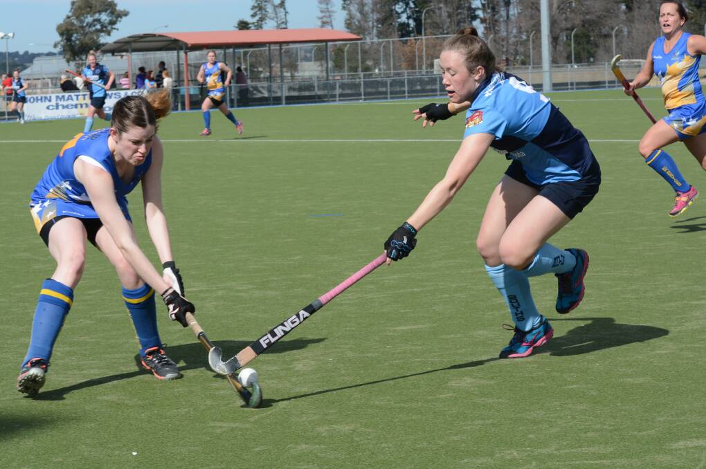 BRIGHT FUTURE: Souths hockey talent Jess Watterson (right) has been named in the Hockey Australia futures squad. Photo: PHILL MURRAY 	080914psouths1
