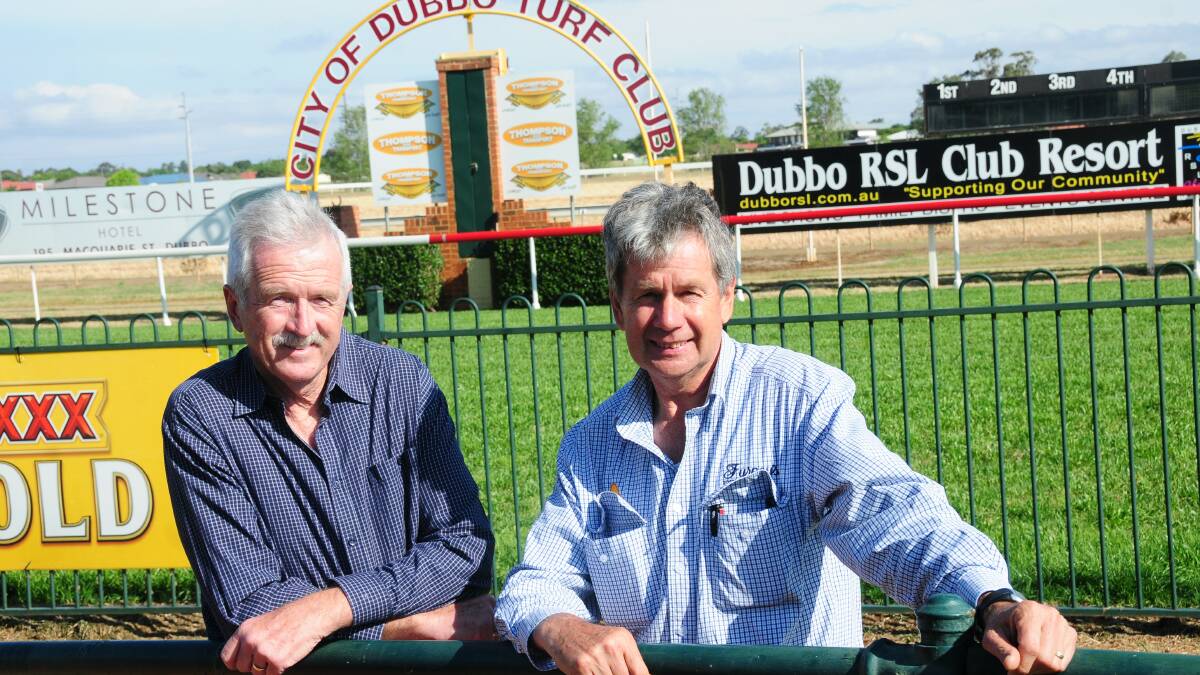 Michael Edwards (right), pictured with Racing NSW's Brian Judd last year, has been forced to step down from his role as Chairman of Dubbo Turf Club. 			        Photo: FILE  