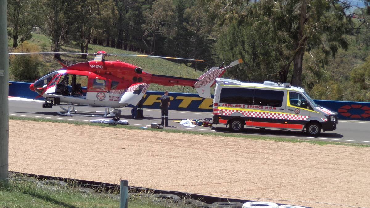 TRAGEDY: A motorcyclist died and his 14-year-old passenger was left with serious injuries following a two-vehicle crash at Mount Panorama on Sunday. Photo: RACHEL FERRETT 	011815rfcrash