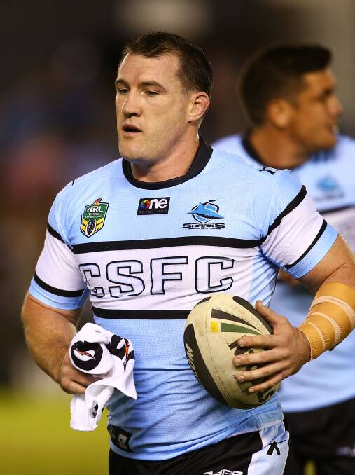 Paul Gallen of the Sharks makes his return from injury as he warms up before the round seven NRL match between the Cronulla-Sutherland Sharks and the Sydney Roosters at Remondis Stadium on April 19, 2014 in Sydney, Australia. Photo: Mark Nolan/Getty Images.