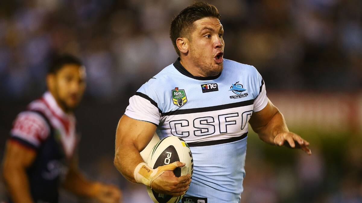 Chris Heighington of the Sharks makes a line break during the round seven NRL match between the Cronulla-Sutherland Sharks and the Sydney Roosters at Remondis Stadium on April 19, 2014 in Sydney, Australia. Photo: Mark Nolan/Getty Images.