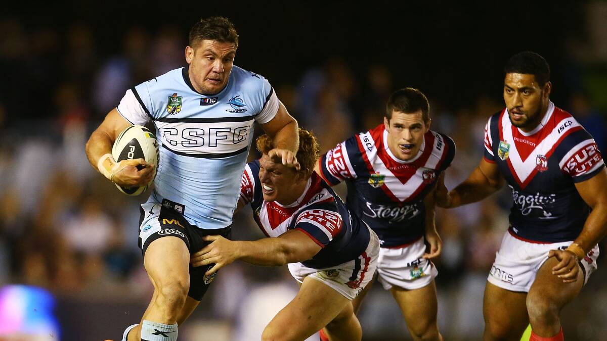 Chris Heighington of the Sharks makes a line break during the round seven NRL match between the Cronulla-Sutherland Sharks and the Sydney Roosters at Remondis Stadium on April 19, 2014 in Sydney, Australia. Photo: Mark Nolan/Getty Images.
