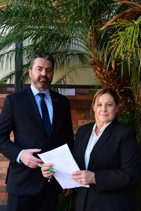 NSW Police Association President Scott Weber and western region executive member Sue Rose are among Association representatives who want a ban on police bringing weapons into court overturned.
   Photo: BELINDA SOOLE.