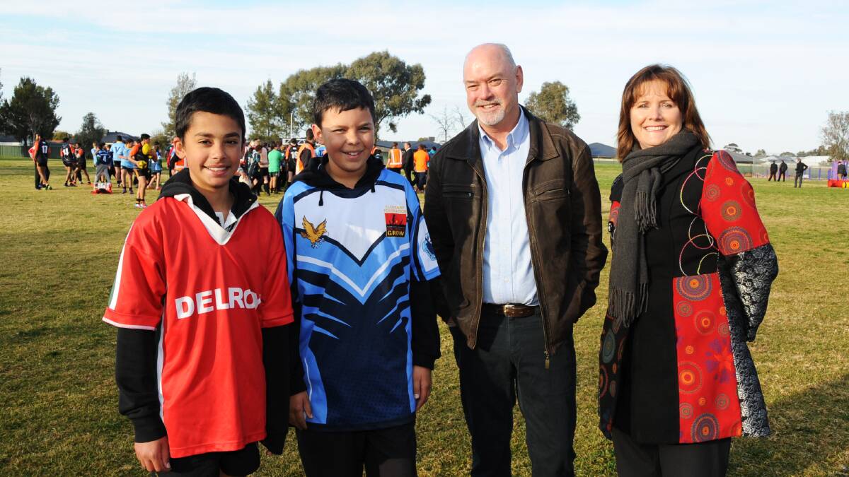 Clayton Daley and Malakai Gibbs from Dubbo College Delroy campus with Clontarf Foundation CEO Gerard Neesham and principal Stacey Exner.								                		           Photo: BELINDA SOOLE.