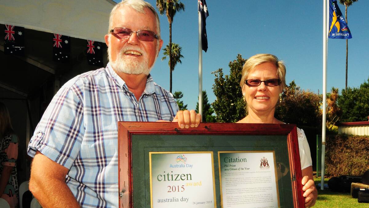 Phil Priest and his wife Annette with his Dubbo Citizen of the Year award. Photo: BELINDA SOOLE.